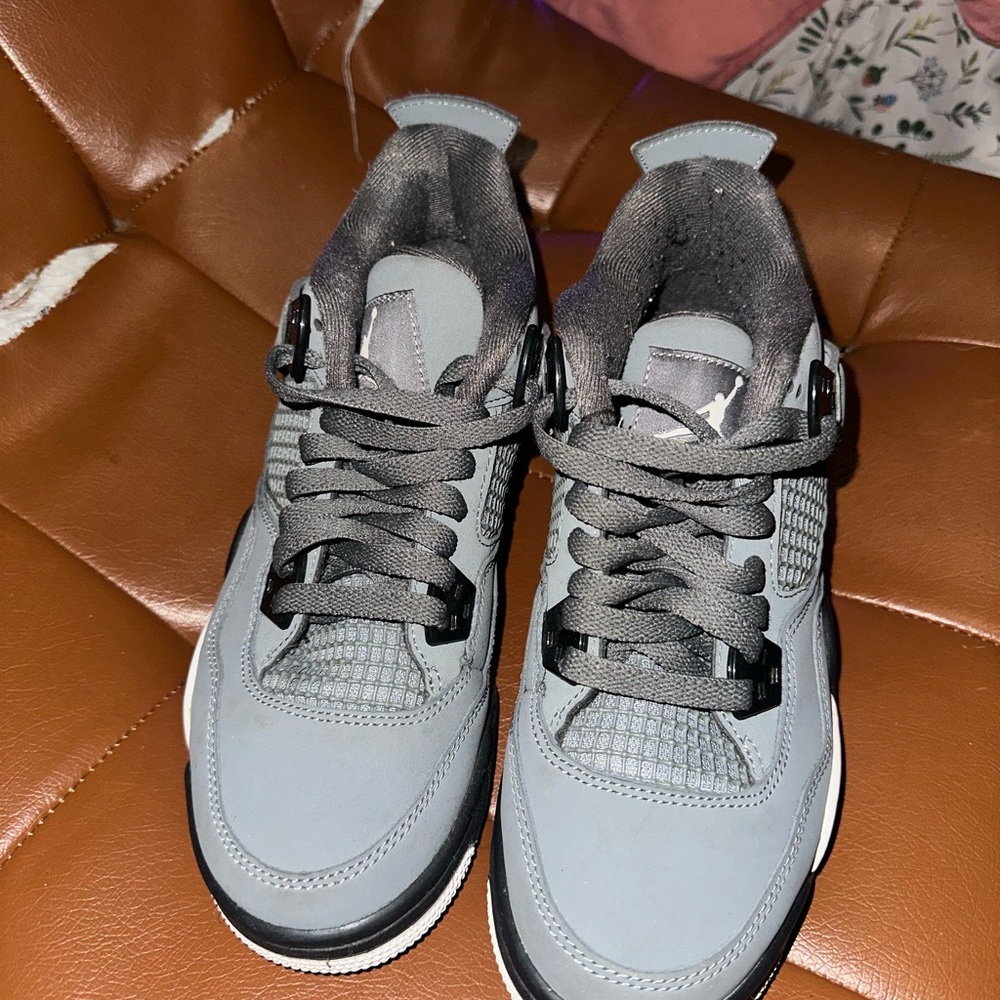 Jordan boys grade school 4s size 6.5 Sneakers in Gray and Black